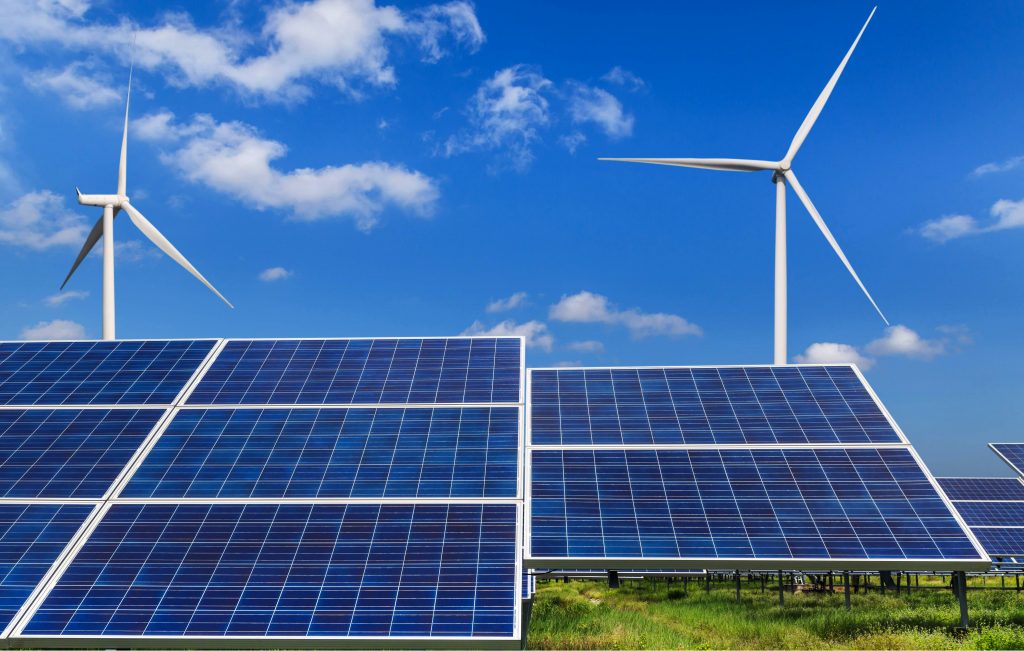 GettyImages--solar panels and wind turbines alternative energy from nature