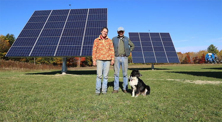 Jan and Rob Goranson with farm solar trackers-CEI