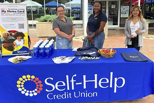 Tabling at Pride in Asheville-Self-Help CU